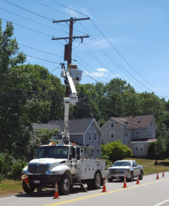 New Hampshire Electricians Working on Utility Pole and Electrical Cables