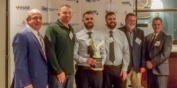 Photograph of Reilly Electrical Contractors Accepting Eagle Award